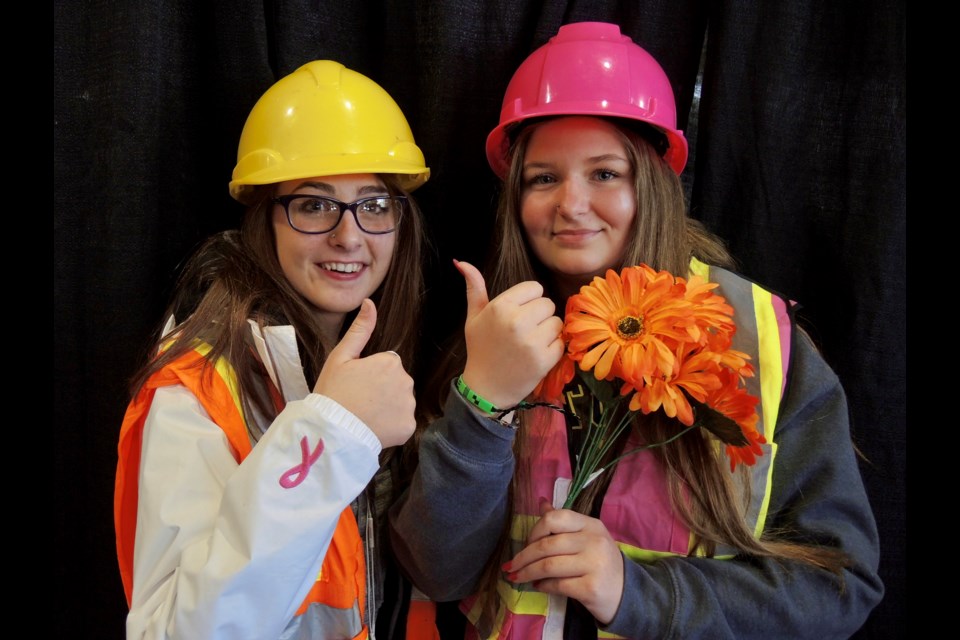 Isabella Mcfarland and  Rhyannne        Laferriere both 16, pose as construction workers in the photo booth.
Sue Sgambati/BarrieToday          