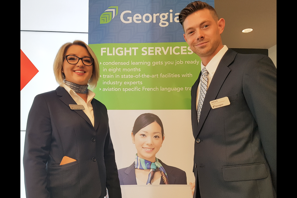 Flight services co-ordinator Alyson Swarbrick and student Jeffrey Brown are shown this morning after a partnership was announced between Georgian College and Jazz Aviation, Friday Sept.20, 2019. Shawn Gibson/BarrieToday