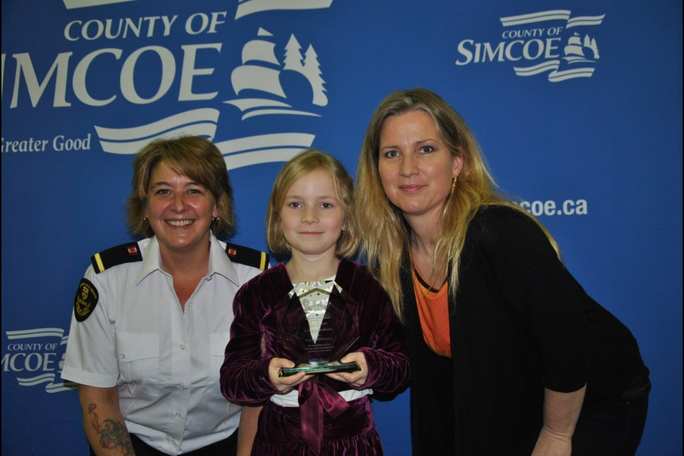 Ali Hepinstall, 7, is pictured with her mom, Jennifer Zardo, and Jennifer Shier, an emergency communicator. Laurie Watt for BarrieToday