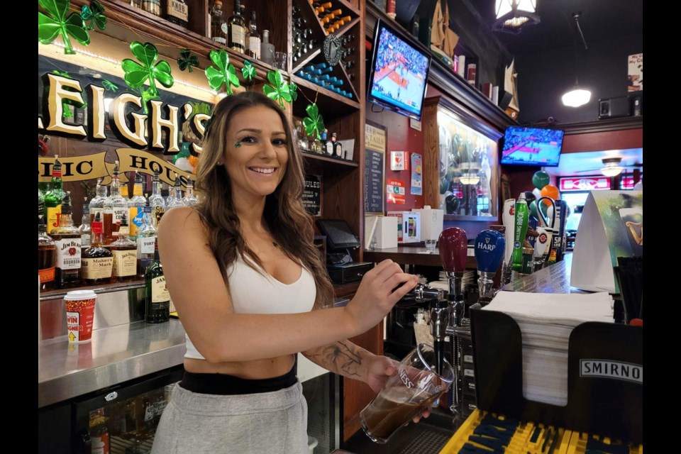 Amber prepares some pints at Donaleigh's Irish Public House in downtown Barrie. 