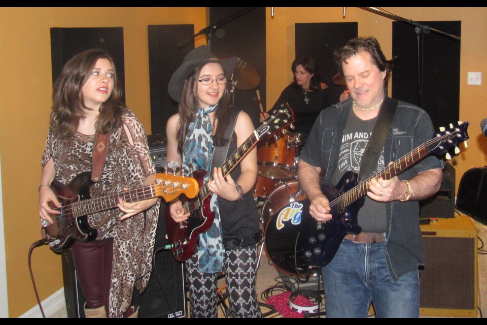 The Argues live in the practice space. Photo by Shawn Gibson for BarrieToday.