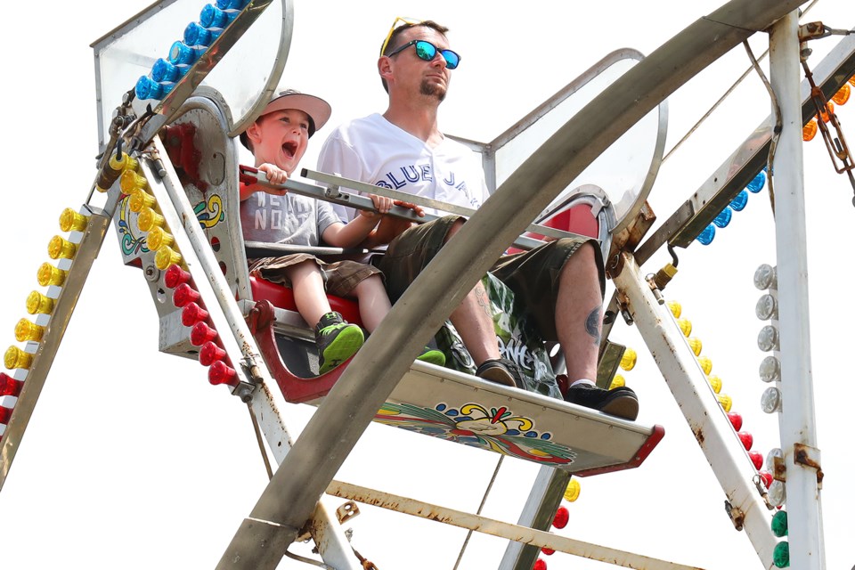 Five-year-old Ryder Jerschaeve is clearly having the time of his life while at the top of the ferris wheel at the 14th Annual Barrie Waterfront Festival on Saturday, May 26, 2018. Kevin Lamb for BarrieToday.
