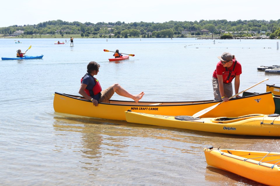 Visitors try out the vessels during the MEC Barrie Paddlefest at Centennial Beach on Saturday, June 16, 2018. The event runs through the weekend until 5pm on Sunday. Kevin Lamb for BarrieToday. 