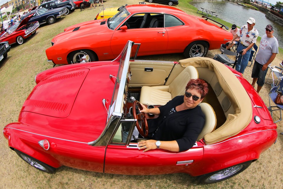 Heather Snyder of Flesherton sits in her 1963 Austin Healey as Barrie Thunder Classics held its Classics in the Park event at Heritage Park in Barrie on Saturday, July 21, 2018. The annual event draws cars from all over Canada and the United States. Proceeds from the event are dontated to Gilda's Club Simcoe Muskoka. Kevin Lamb for BarrieToday.