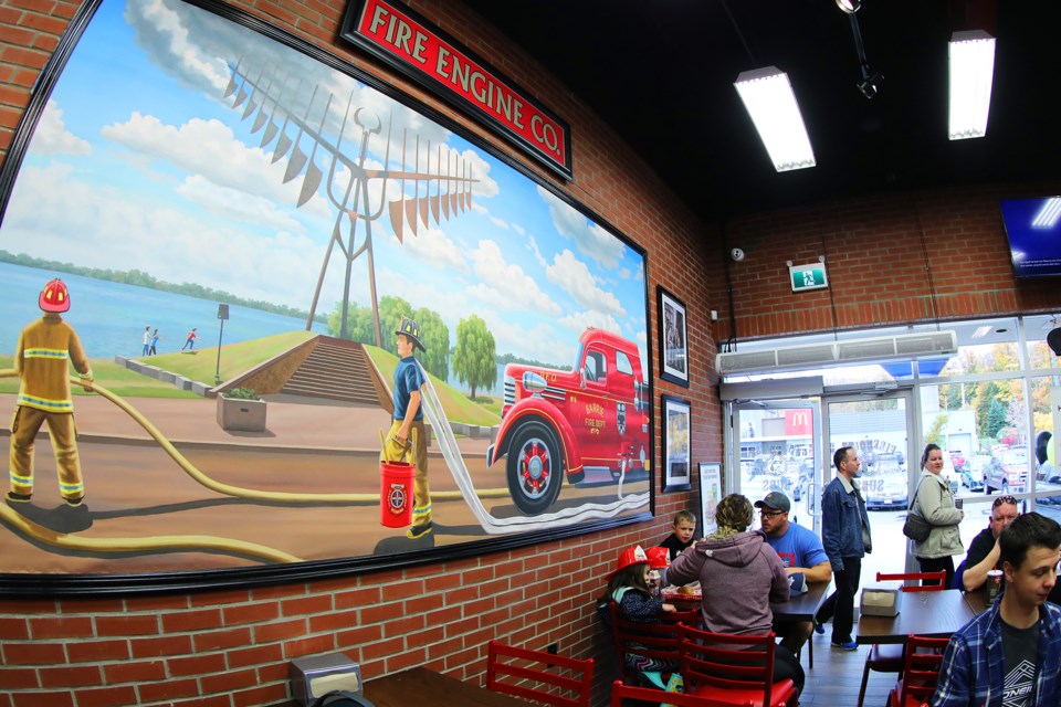 Firehouse Subs on Bayfield Street, a restaurant chain founded by firemen, held its grand opening on Saturday, October 13, 2018. The store boasts an original painting by the company's Chief Mural Artist, Joe Puskas. Kevin Lamb for BarrieToday.