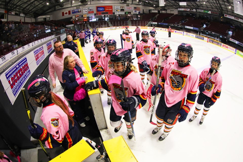 The AA PeeWee Barrie Sharks of the Barrie Women's Hockey Association took on the Etobicoke Dolphins during the Ice'd Pink fundraiser for Breast Cancer Awareness Month at the Barrie Molson Centre on Saturday. This year's event honours Melissa Sutton. Kevin Lamb for BarrieToday. 