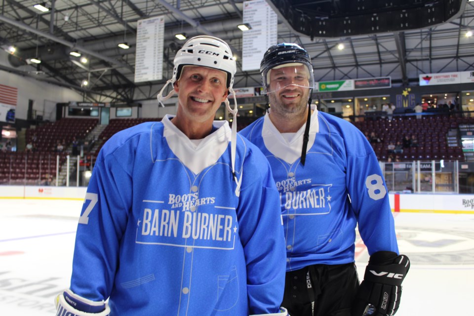 Former NHLer Gary Roberts (left) and local MP Alex Nuttall, who organized the event, are shown prior to the Boots and Hearts Barn Burner charity hockey game held Wednesday, Aug. 7, 2019 at the Barrie Molson Centre. Raymond Bowe/BarrieToday