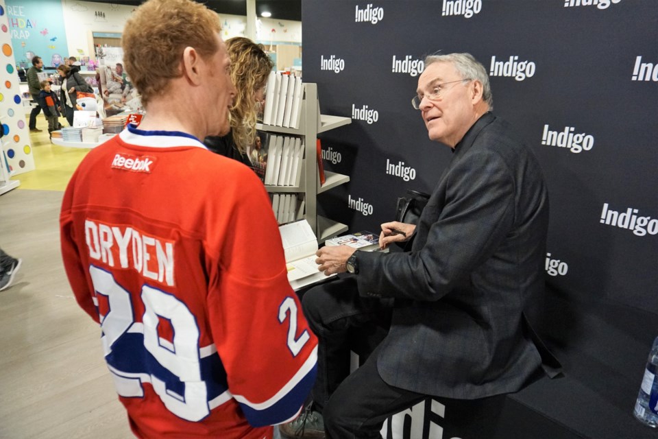 Ken Dryden fan Jeff Cooper was first in line to meet Dryden during his book signing at Indigo in Barrie on Saturday. Jessica Owen/BarrieToday 
