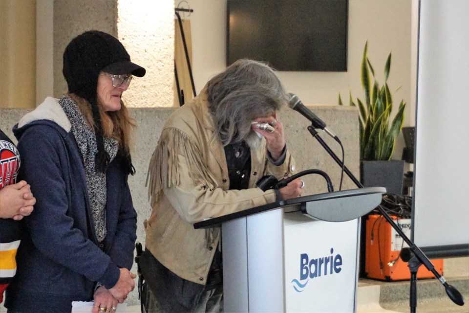 Lori and Brian try to hold back tears while talking about their daughter Krystal, who died in April, during Barrie's Homeless Memorial Service. Jessica Owen/BarrieToday    