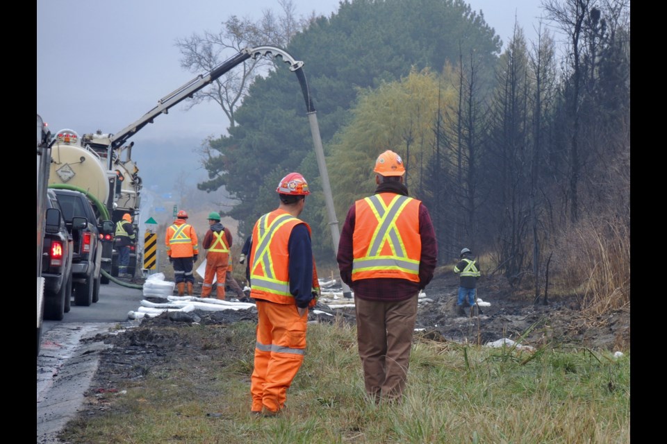 Crews have begun cleaning up diesel fuel spilled during Tuesday night's horrific crash on Highway 400. Sue Sgambati/BarrieToday          