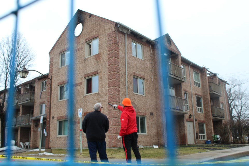 Crews assess the damage at 100 Little Ave., following a fire on Monday night. Raymond Bowe/BarrieToday