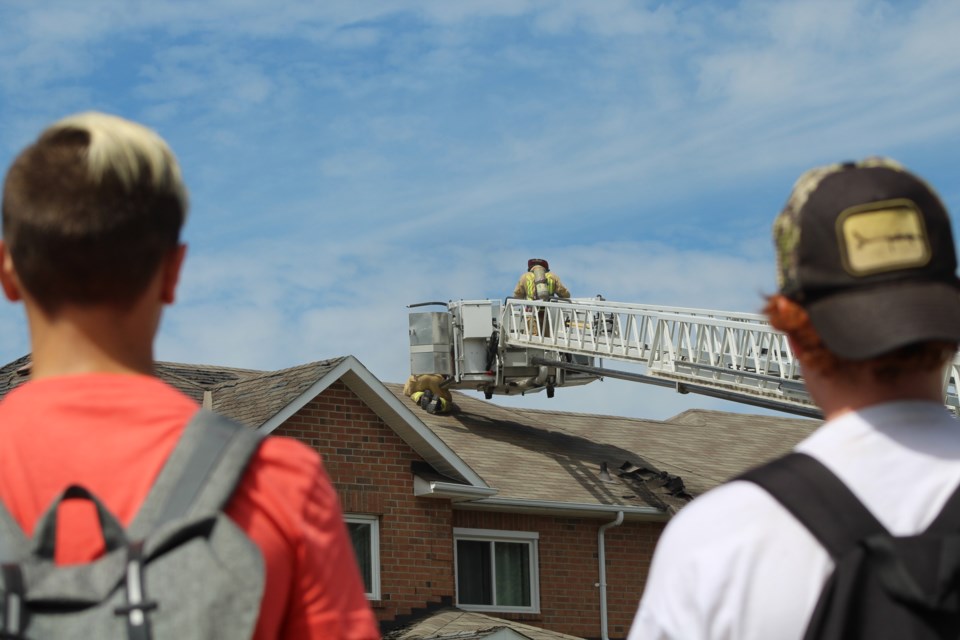 Barrie firefighters battle a blaze, Tuesday afternoon, on Lyfytt Crescent in the city's north end. Raymond Bowe/BarrieToday