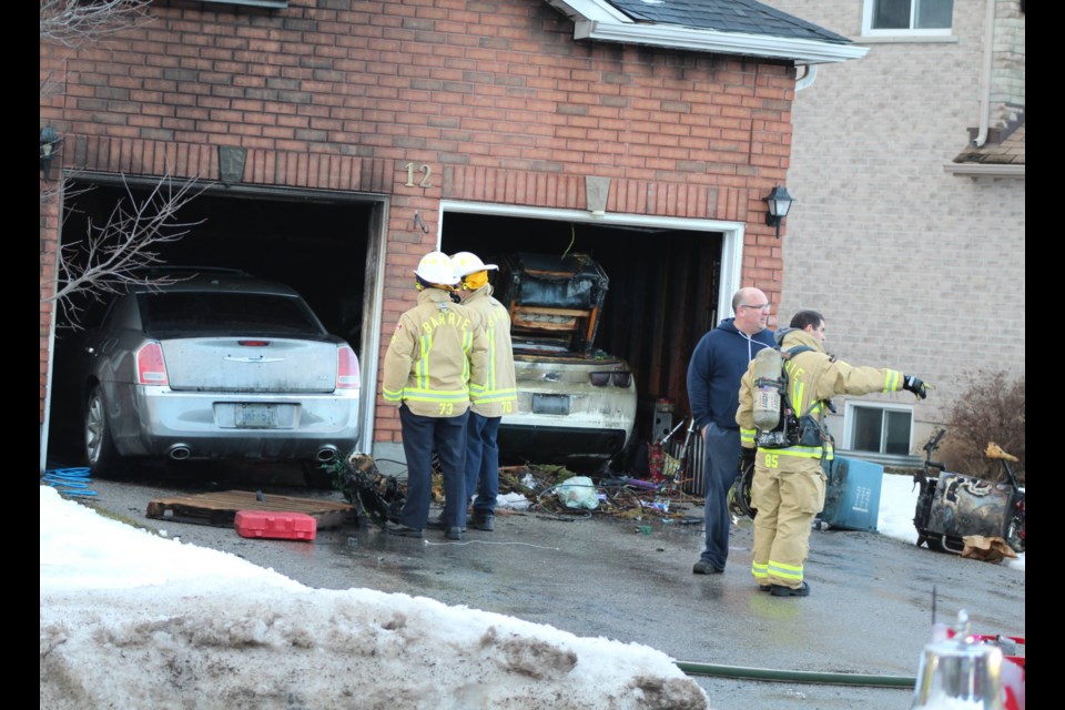Barrie firefighters were called to a home on McAvoy Drive on Monday, Dec. 30, 2019, after a vehicle caught inside the garage. Raymond Bowe/BarrieToday