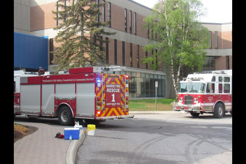 Smoke billows into other buildings during fire at college ...