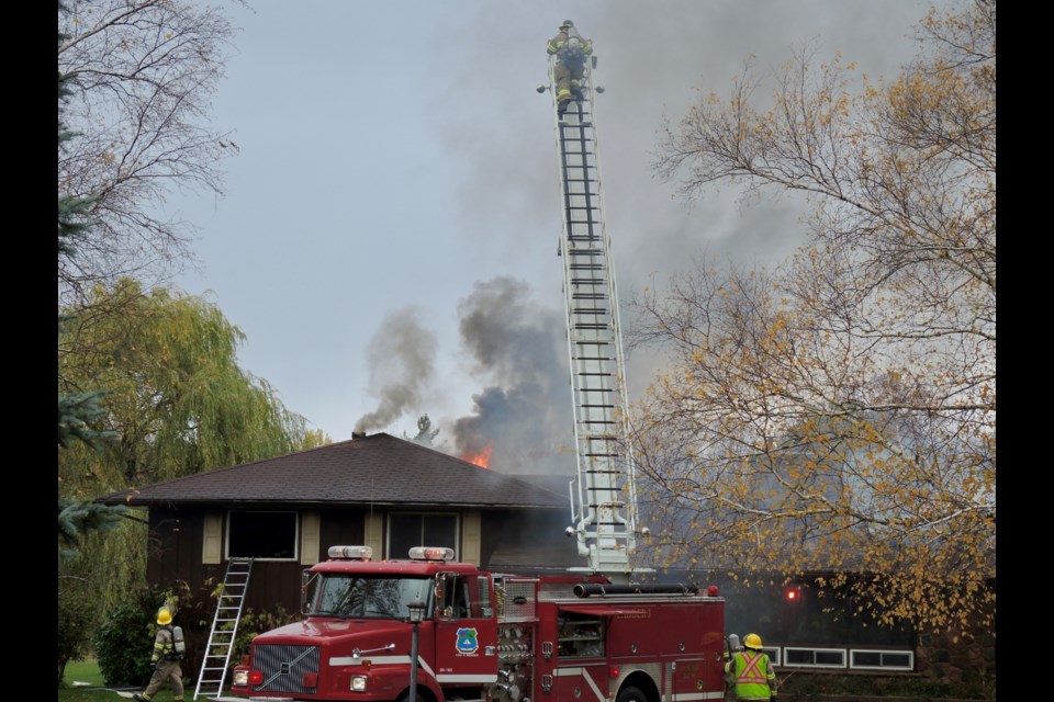 Firefighters battled a house fire at Big Bay Point Road near Prince William Drive on Monday, Oct. 30, 2017. Sue Sgambati/BarrieToday         