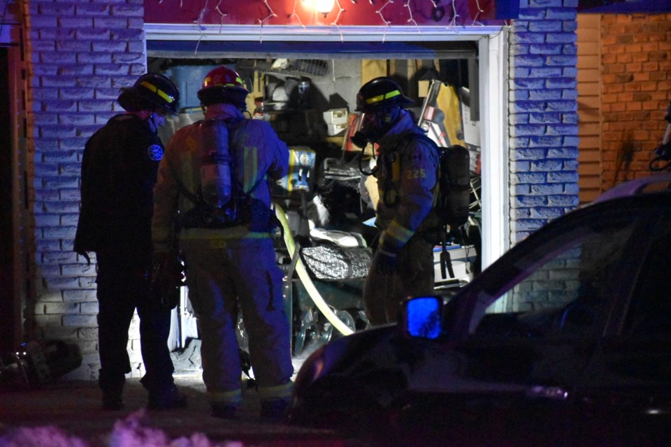 Just before 11 p.m., Friday, Barrie firefighters were called to Scott Crescent for a garage fire. | Michael Chorney/At the Scene Photography