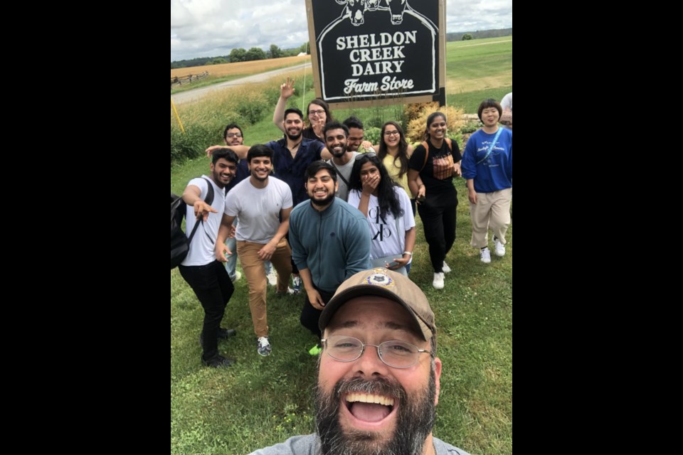 Columnist Daniel Clements having great fun on the farm with Georgian College culinary students.