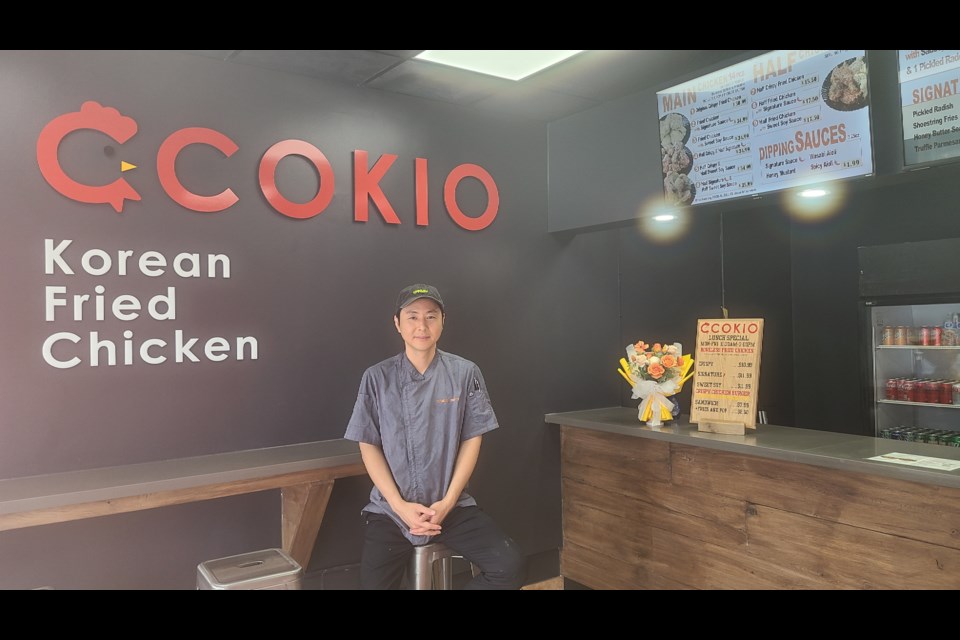 Ccokio owner Chanyoung Jung, known as CJ, stands at the door of his south-end Barrie restaurant, which has received strong reviews for its take-out. It specializes in Korean fried chicken and is located at the corner of Little Avenue and Bayview Drive.