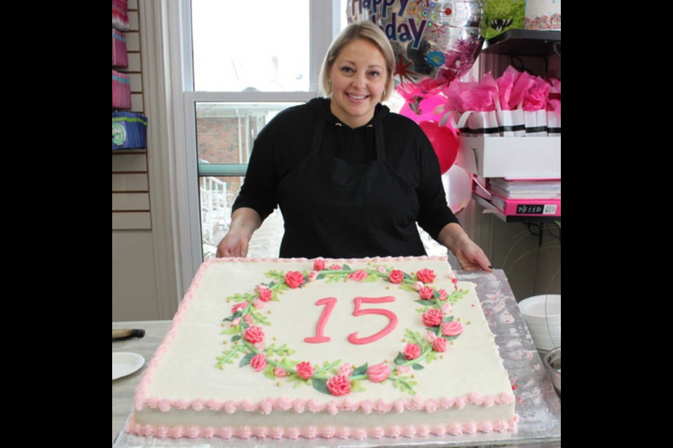 Jennifer Mayrl, of Cakes by Design, celebrates her shop's 15th anniversary is this pre-pandemic photo. 