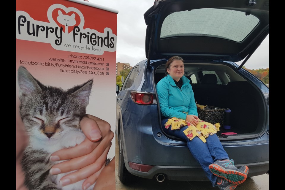 Volunteer Nicole Swyers is dedicated to helping out Furry Friends at Pet Valu today, Saturday Oct. 12, 2019. Shawn Gibson/BarrieToday