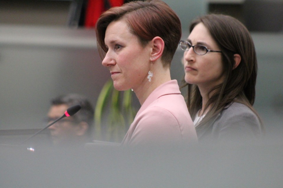 Dr. Rebecca Van Iersel (left) from the North Simcoe Muskoka LHIN, and Dr. Lisa Simon, associate medical officer of health with the Simcoe Muskoka District Health Unit, listen to a question from a member of Barrie city council, Monday night. Raymond Bowe/BarrieToday