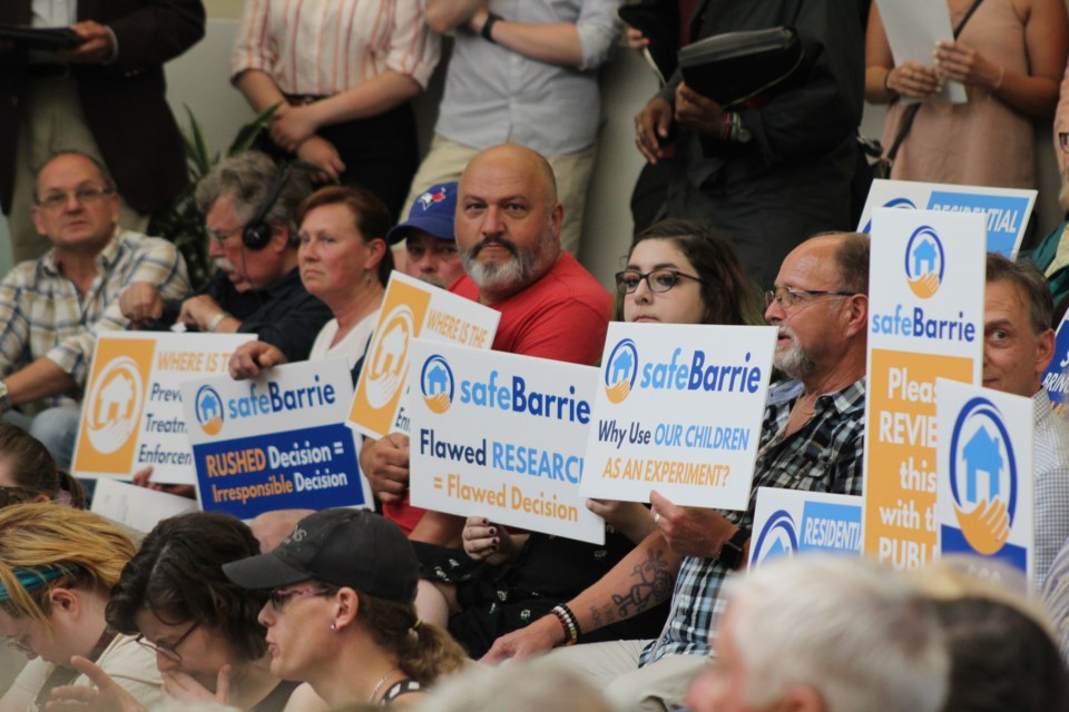 Several members of the new group Safe Barrie were in attendance at city council on Monday, June 24, 2019 carrying signs showing their opposition to a proposed safe injection site in downtown Barrie. Raymond Bowe/BarrieToday