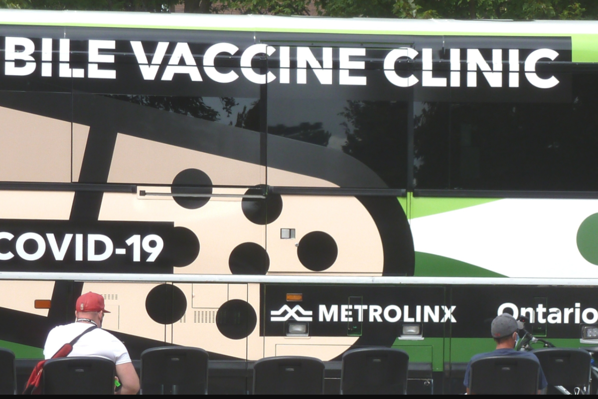 People getting on board with mobile vaccination buses
