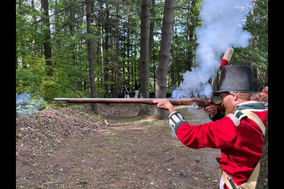 Arthur resident Joe Brunt, a re-enactor with the Incorporated Militia of Upper Canada takes aim. The Festival at Fort Willow was held Saturday at the local conservation area in Springwater Township. 