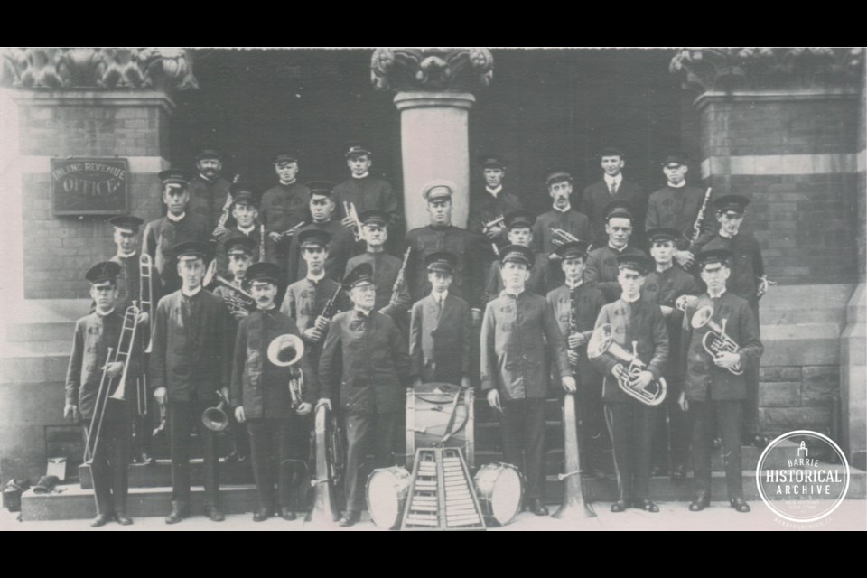Barrie band, possibly in front of the old post office at Memorial Square, circa 1913. 