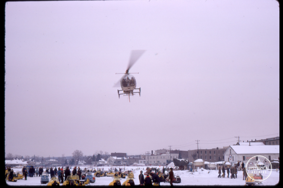 A helicopter hovers over Kempenfelt Bay during the 1973 Winter Carnival. Photo courtesy of the Barrie Historical Archive