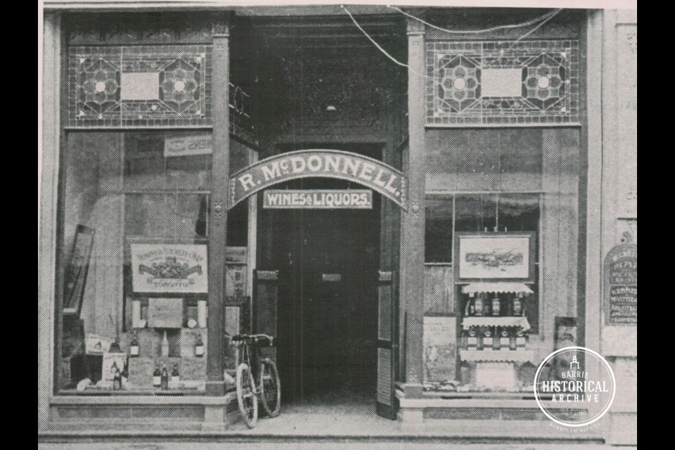 The address at 23 Dunlop St. E., in downtown Barrie, as it appeared in 1897 when it housed R. McDonnell Wines and Liquors. Photo courtesy of the Barrie Historical Archive