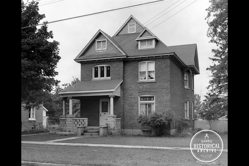 The former Lem home located at 203 Dunlop St. W., circa 1960.