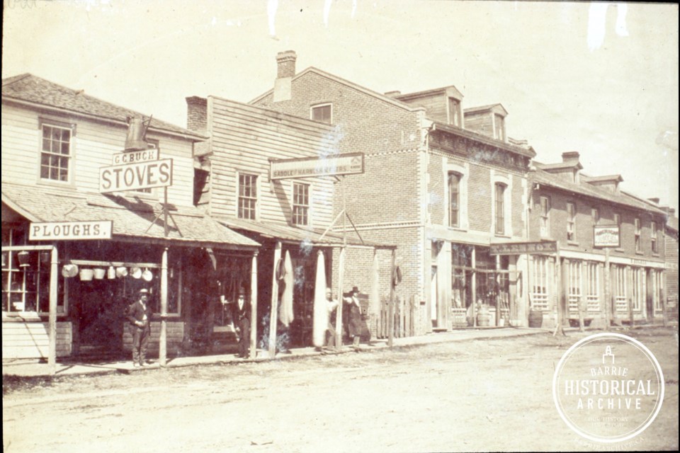 The business buildings of the west side of Bayfield Street, just north of Five Points, including the saddlery that later became Fraser's. These buildings burned in 1876.