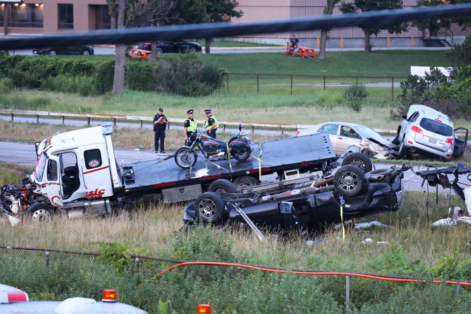 A multi-vehicle accident shut down the southbound lanes of Highway 400 between Duckworth Street and Bayfield Street in Barrie on Thursday, August 2, 2018. Kevin Lamb for BarrieToday.