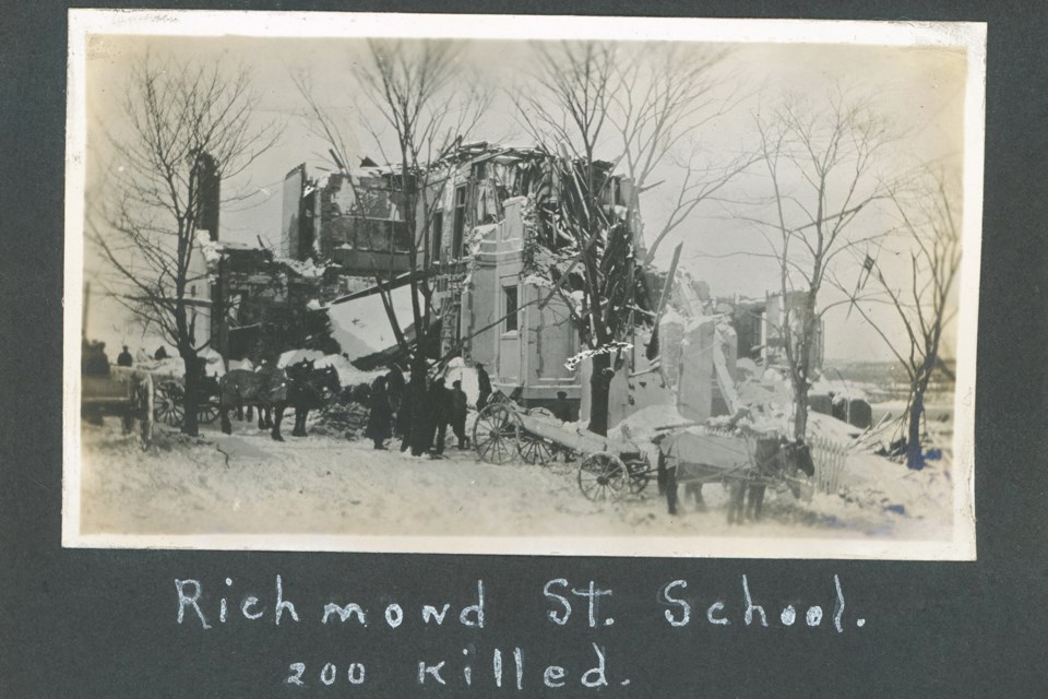 1917 photo postcard of soldiers at building destroyed in Halifax explosion