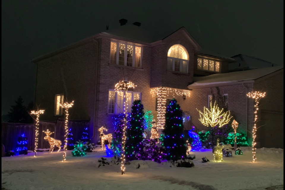 All lit up for Christmas at the corner of Mapleton Avenue and Silvercreek Crescent in south-end Barrie. 
