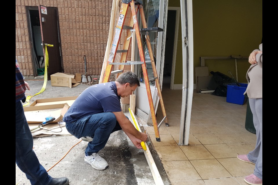 Hope City Church pastor Kevin Mast and his team were hard at work Saturday repairing the damage done by a pick-up truck, May 18 2019. Shawn Gibson/BarrieToday