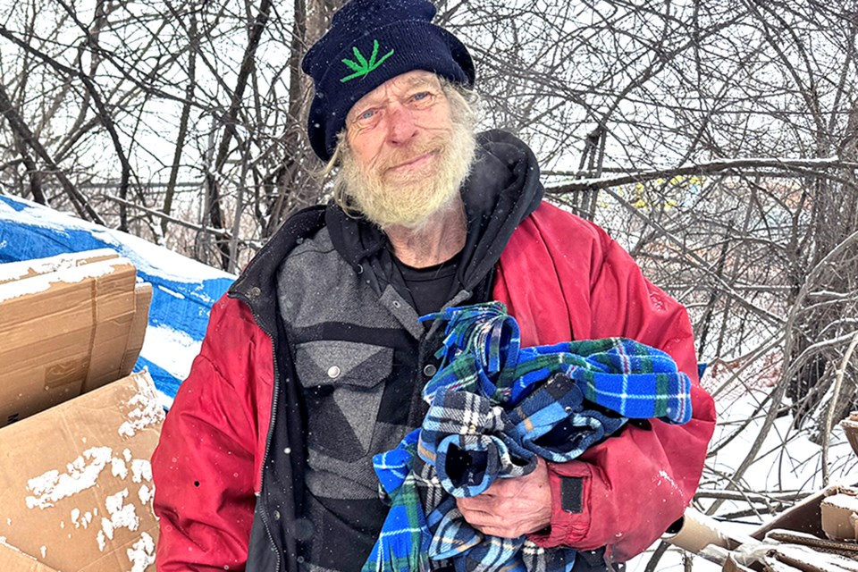 Rick, The Mayor, 75, stands outside his makeshift home near Anne Street South and Victoria Street in Barrie on Tuesday, Jan. 16, 2024. He was found dead on Saturday, Feb. 17.