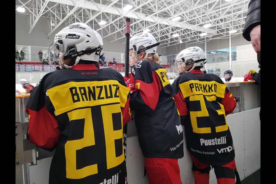 The Jokerit players watch on and wait for their turn to hit the ice on Saturday, Jan. 4. Shawn Gibson/BarrieToday