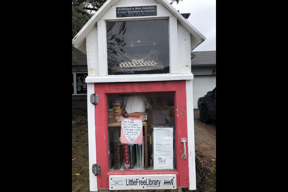 The Little Free Library in front of Cassandra Rutherford's home is being shut down for now, as fear of COVID-19 staying on items has her playing it safe.Photo supplied