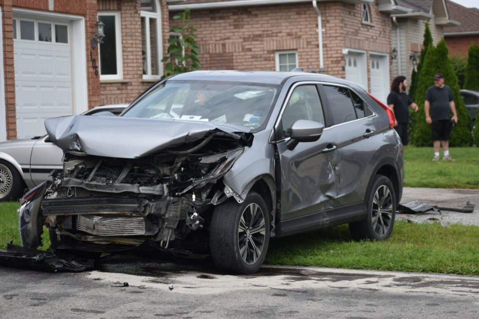 The aftermath of a crash scene, Tuesday, on Marsellus Drive in south-end Barrie. 