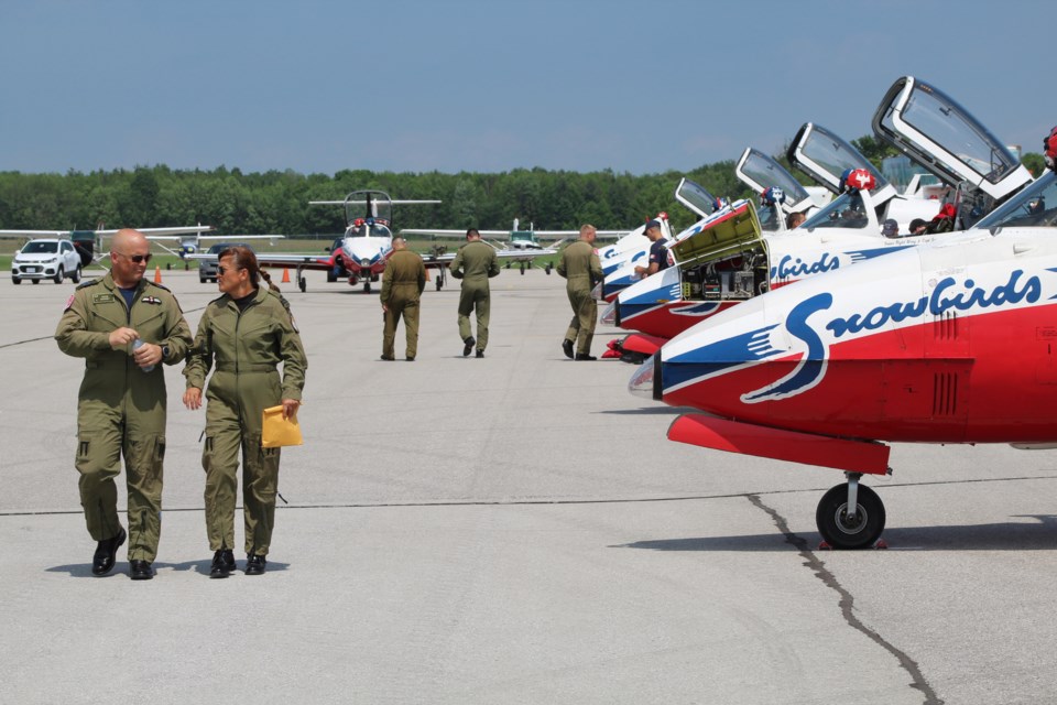 Navy Lieut. Michele Tremblay, left, public affairs officer for the Snowbirds, and team leader Maj. Denis Bendet are shown in a 2018 photo at Lake Simcoe Regional Airport. | Raymond Bowe/BarrieToday files