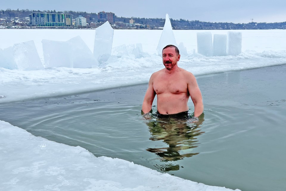 Nick Gorte enjoys the one-degree water in Kempenfelt Bay in Barrie on Saturday.