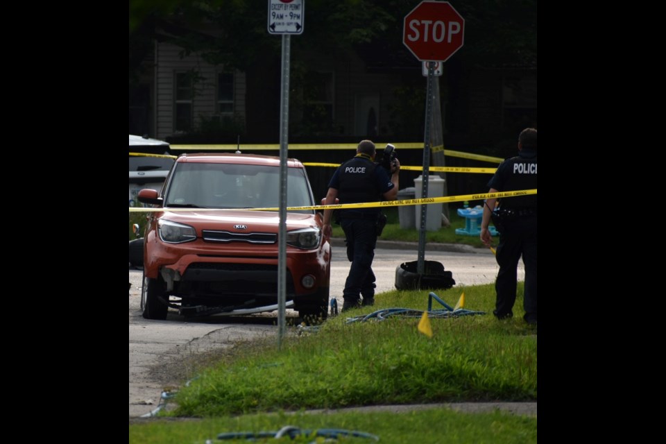 Police investigate the scene of a fatal motorcycle crash in Barrie on Wednesday, Aug. 2, 2023.