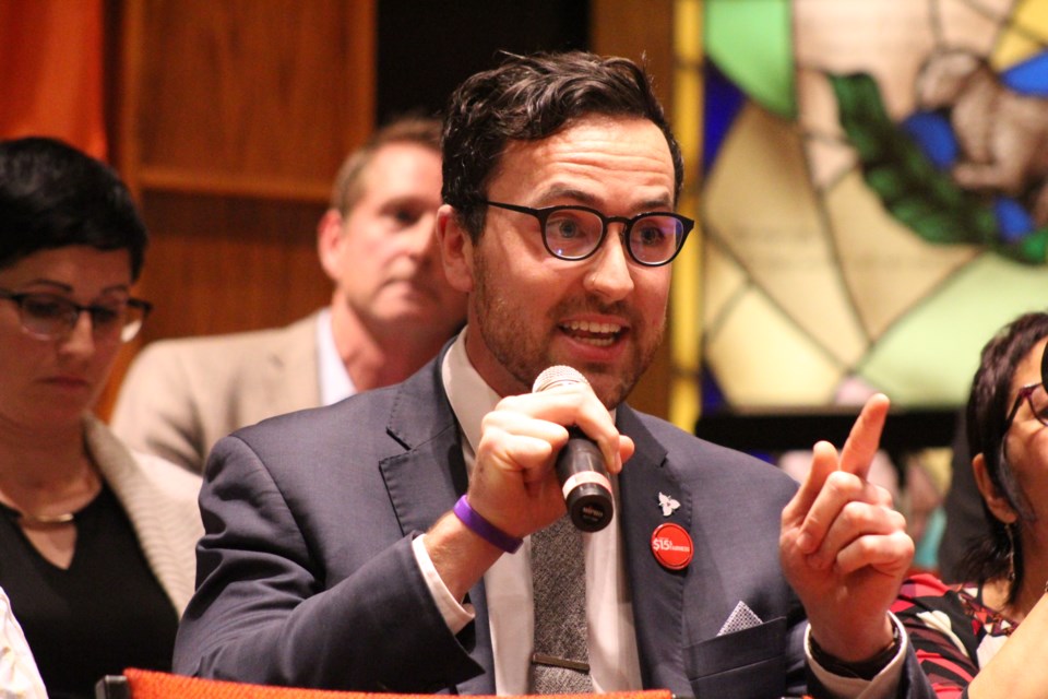 Keenan Aylwin answers a question at Tuesday night's all-candidates accountability assembly at Grace United Church in Barrie. Raymond Bowe/BarrieToday