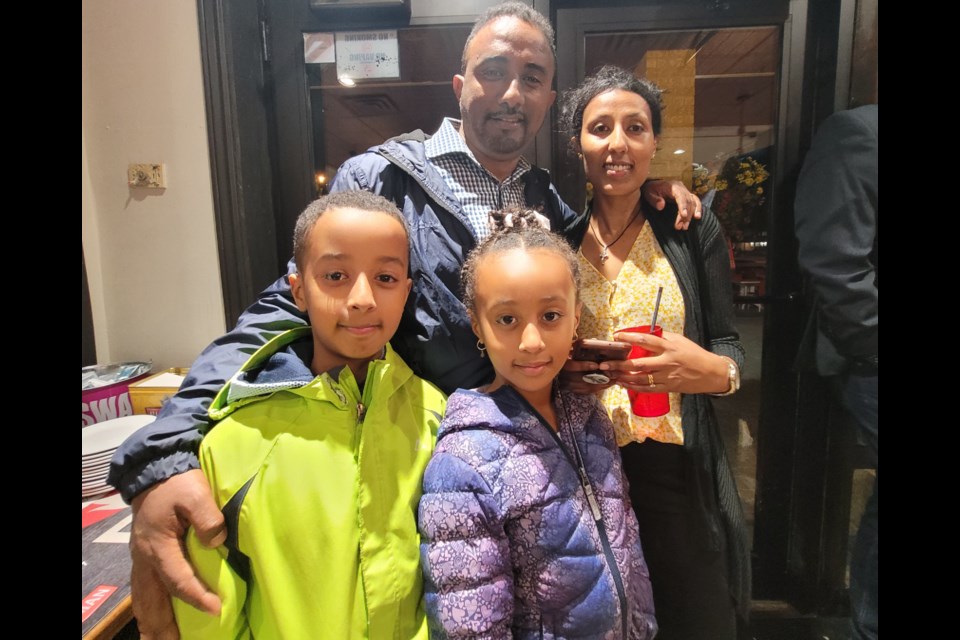 Newly elected Nigussie Nigussie poses with his wife Hanna and their two children, nine-year-old Abinet (bottom left) and seven-year-old Maya (bottom right), at an election party on Monday night.