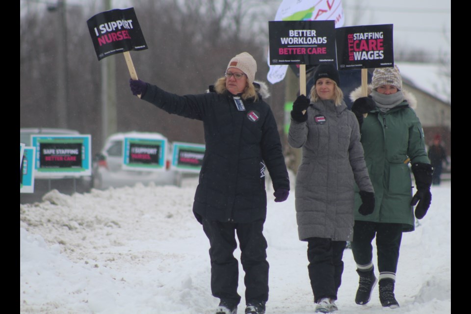 Members and supporters of the Ontario Nurses’ Association picket in front of Royal Victoria Regional Health Centre in Barrie on Thursday, Feb. 23.