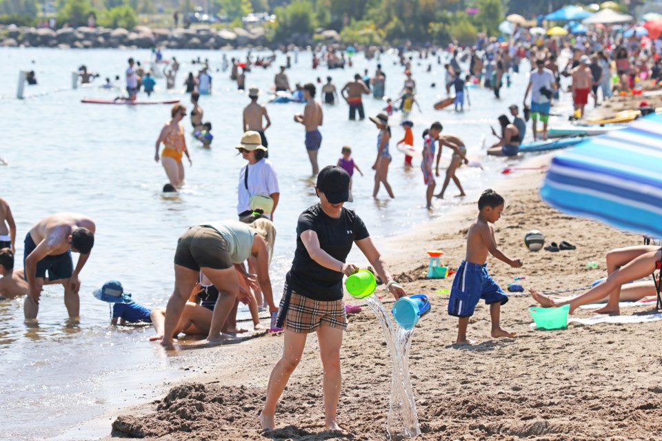 People try and beat the heat at Centennial Beach in Barrie on a hot Labour Day Monday, where the high reached 31 C. 