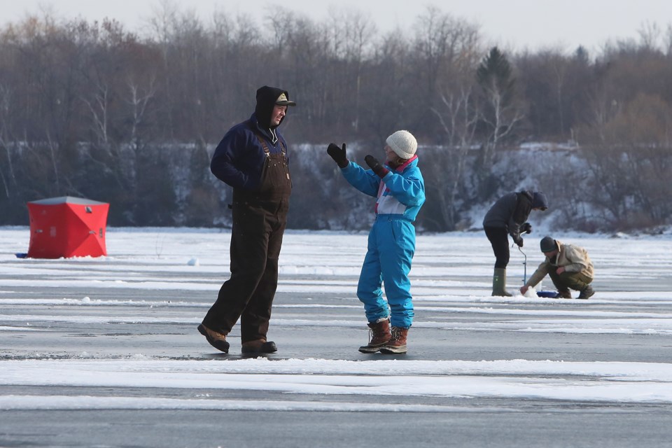 Some people talked about fish while others went after them on Kempenfelt Bay in Barrie on Saturday, Jan. 20, 2018.  Kevin Lamb for BarrieToday