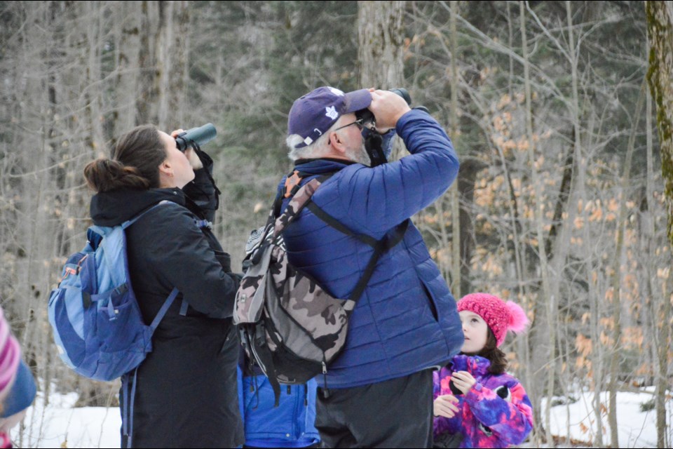 Bird watchers are shown at the Tiffin Conservation Area.